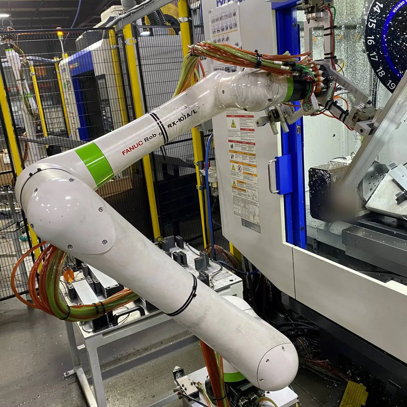 Collaborative robot loading a CNC lathe