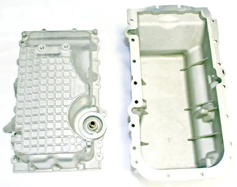 Two aluminum die cast oil pans