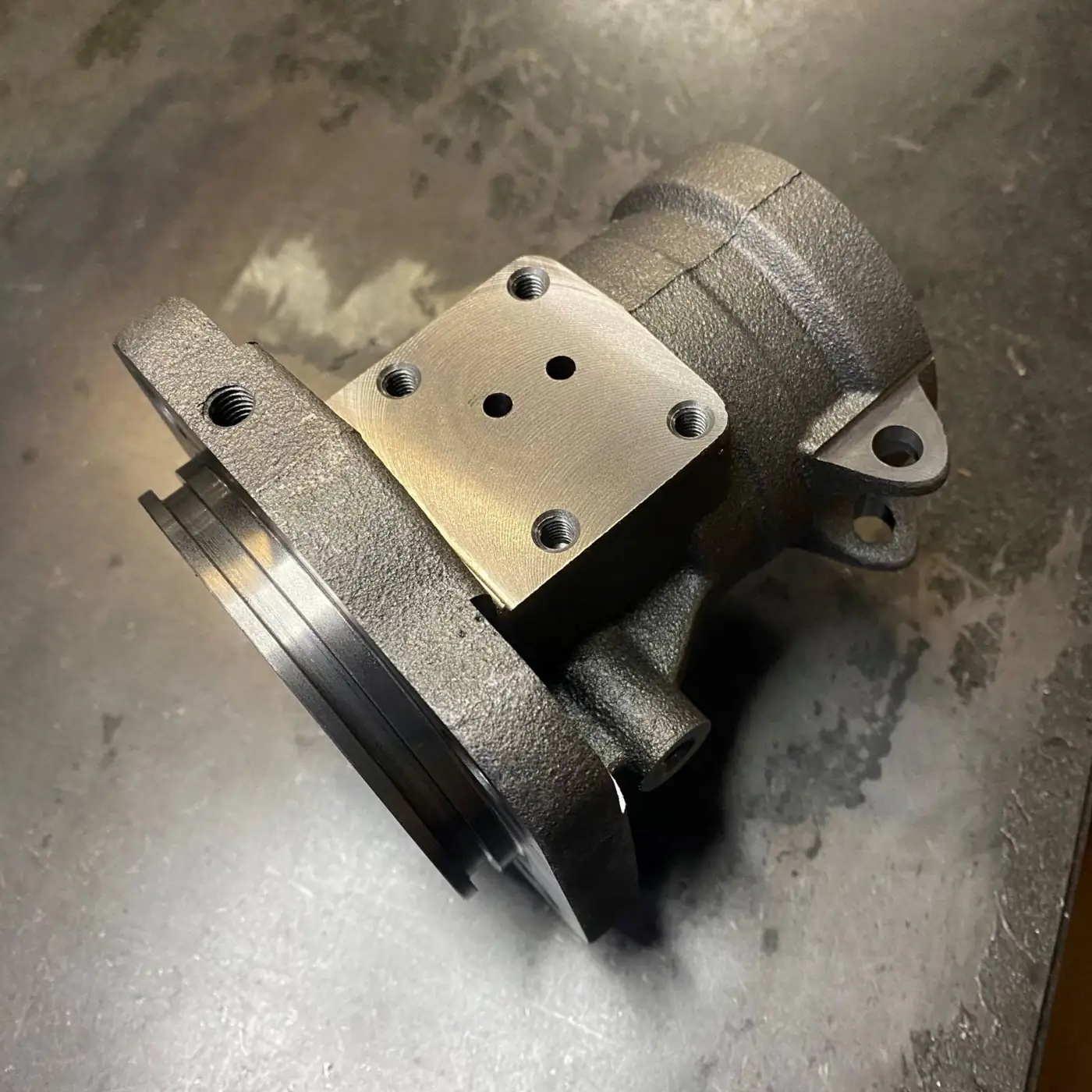 Machined iron hydraulic valve body